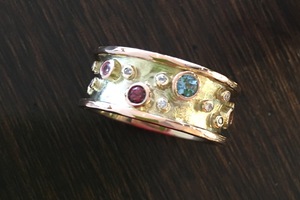 handmade 9ct gold ring remodel set with scattered diamonds and aqua, garnet and pink sapphire by charmian beaton design