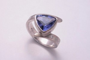 Trillion cut tanzanite and diamond dress ring hand made in 18ct white gold by charmian beaton design