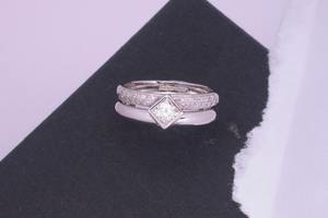 .50ct princess cut diamond bespoke engagement and diamond set wedding ring suite, handmade by charmian beaton design